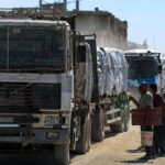 Israel Suspends Aid Deliveries to Gaza
